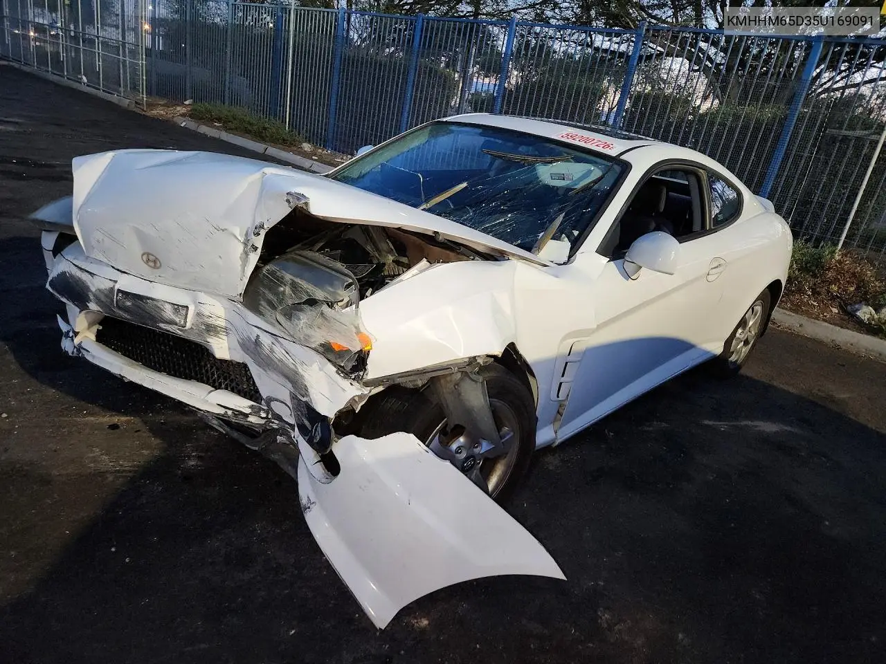2005 Hyundai Tiburon VIN: KMHHM65D35U169091 Lot: 59200726