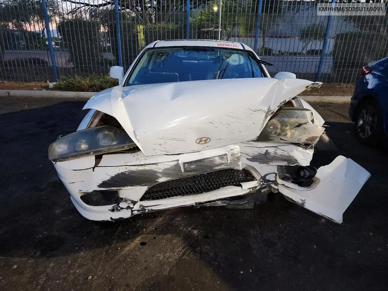 2005 Hyundai Tiburon VIN: KMHHM65D35U169091 Lot: 59200726