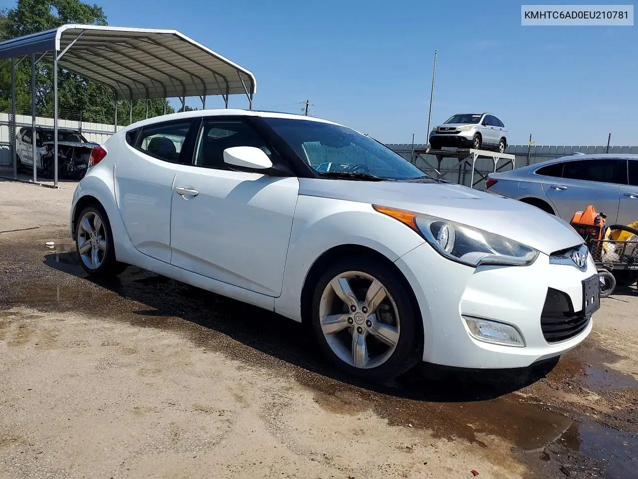 2014 Hyundai Veloster Base VIN: KMHTC6AD0EU210781 Lot: 61090526