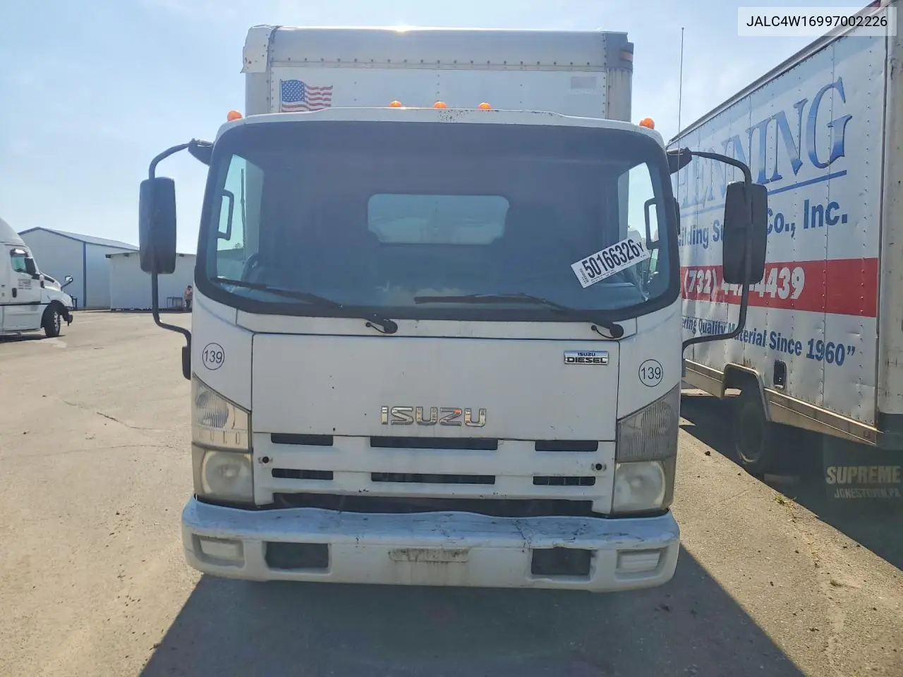 2009 Isuzu Npr Box Truck VIN: JALC4W16997002226 Lot: 50166326