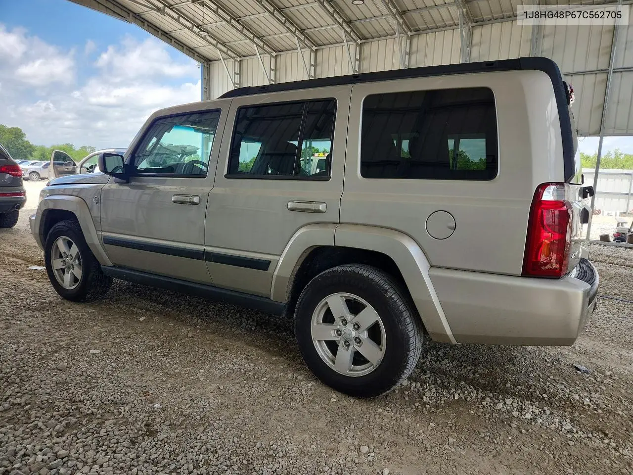2007 Jeep Commander VIN: 1J8HG48P67C562705 Lot: 56990176