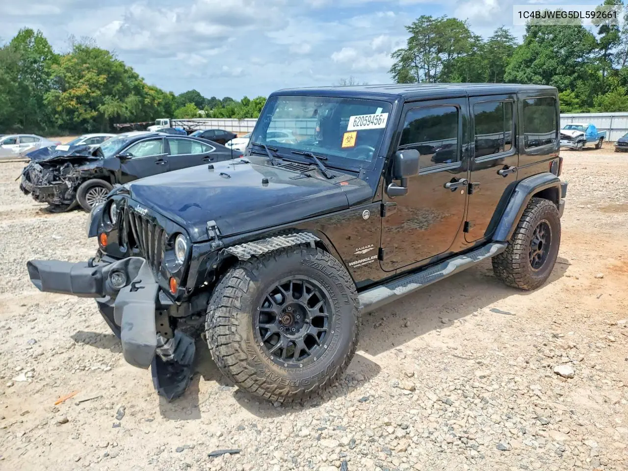 2013 Jeep Wrangler Unlimited Sahara VIN: 1C4BJWEG5DL592661 Lot: 62059456
