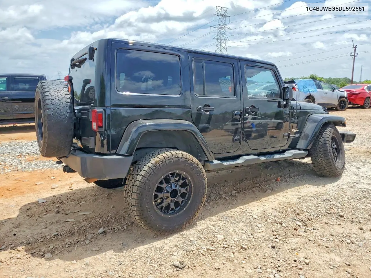 2013 Jeep Wrangler Unlimited Sahara VIN: 1C4BJWEG5DL592661 Lot: 62059456