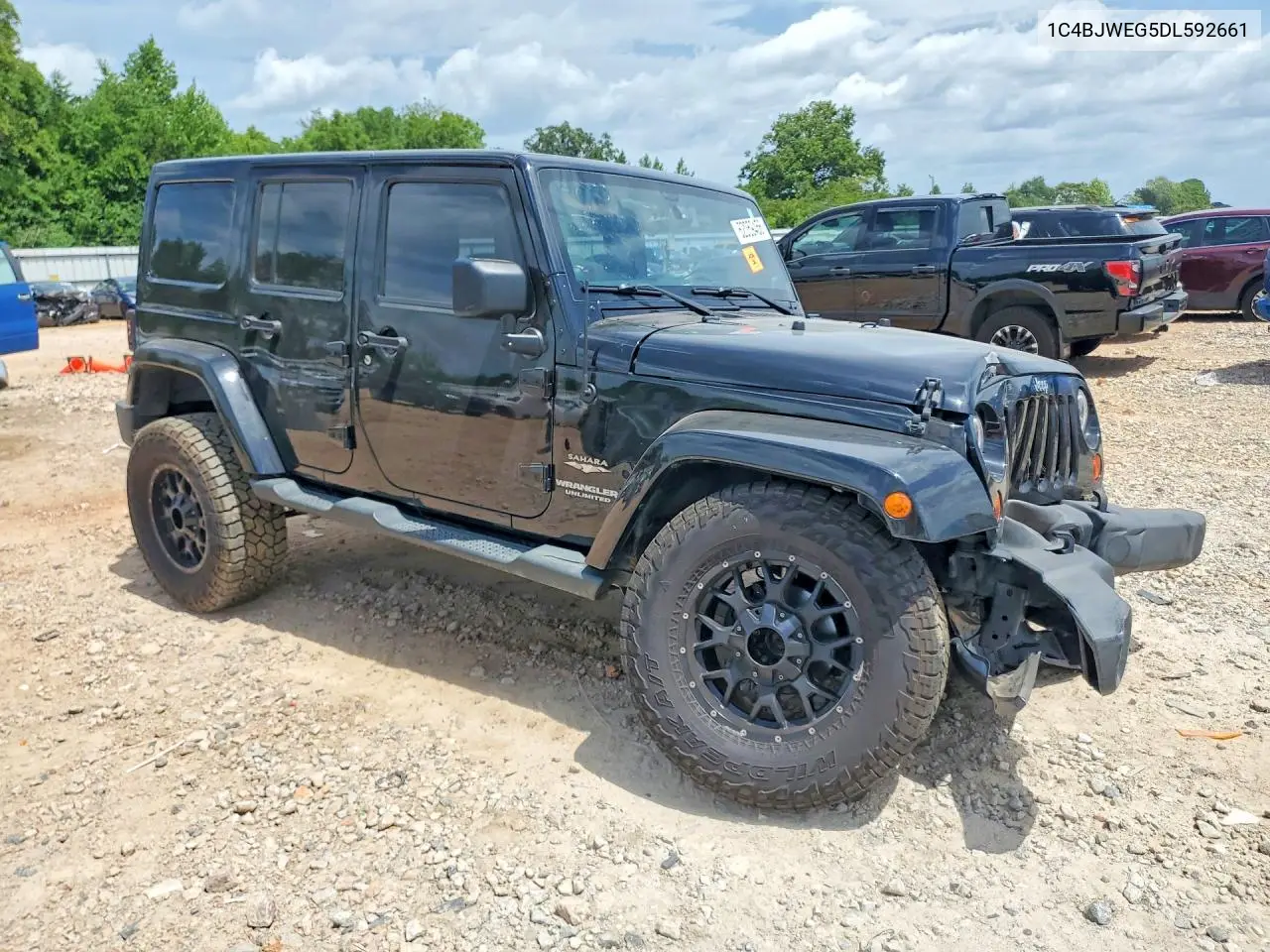 2013 Jeep Wrangler Unlimited Sahara VIN: 1C4BJWEG5DL592661 Lot: 62059456