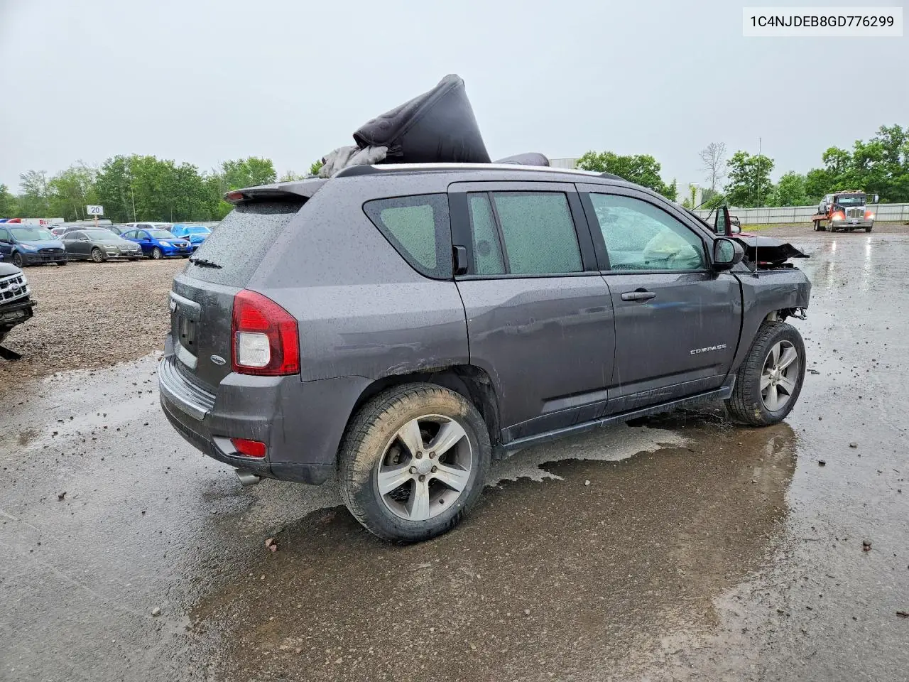 2016 Jeep Compass Latitude VIN: 1C4NJDEB8GD776299 Lot: 57702476