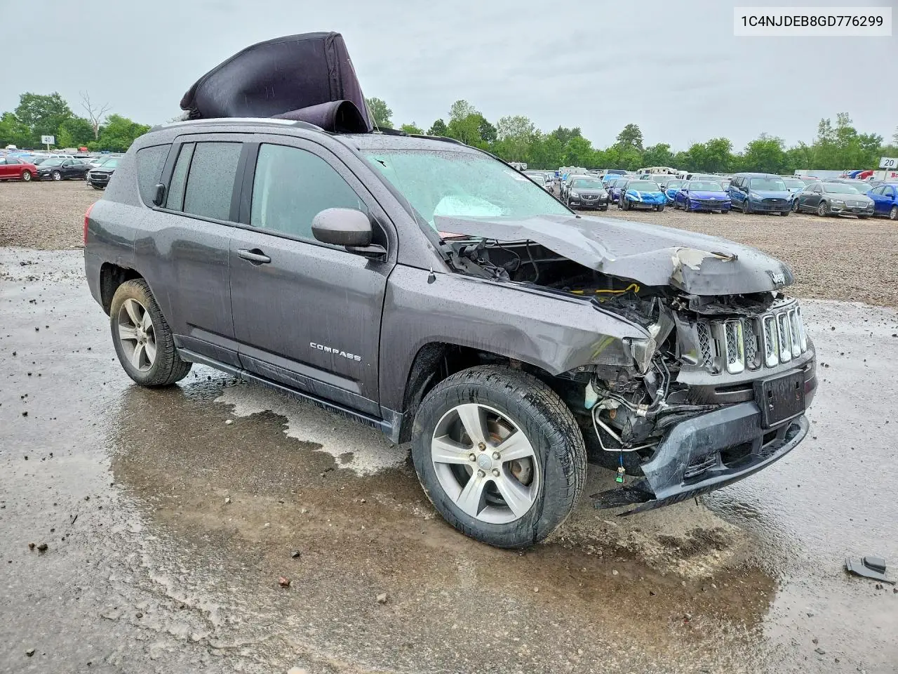 2016 Jeep Compass Latitude VIN: 1C4NJDEB8GD776299 Lot: 57702476