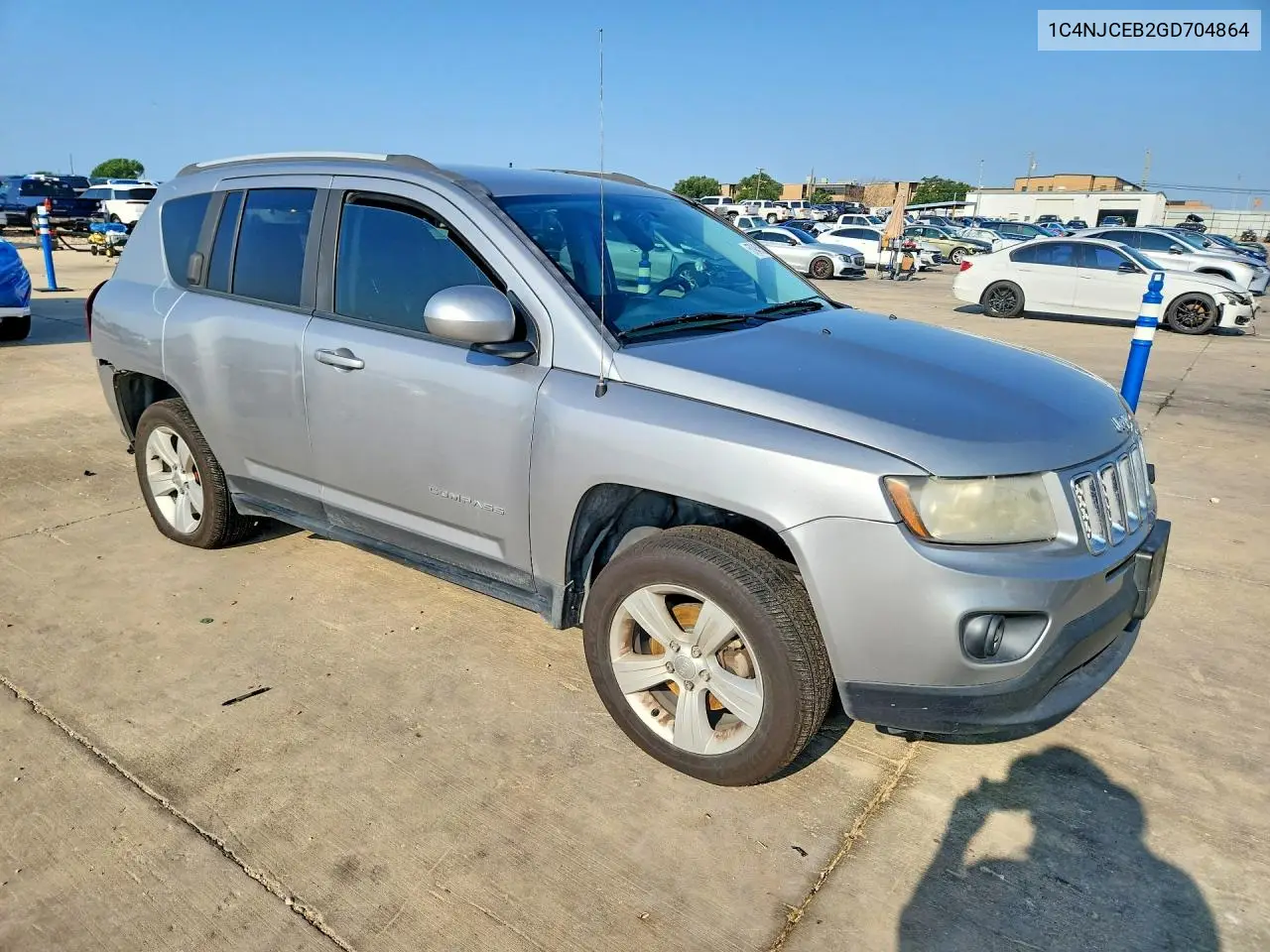2016 Jeep Compass Latitude VIN: 1C4NJCEB2GD704864 Lot: 57945156