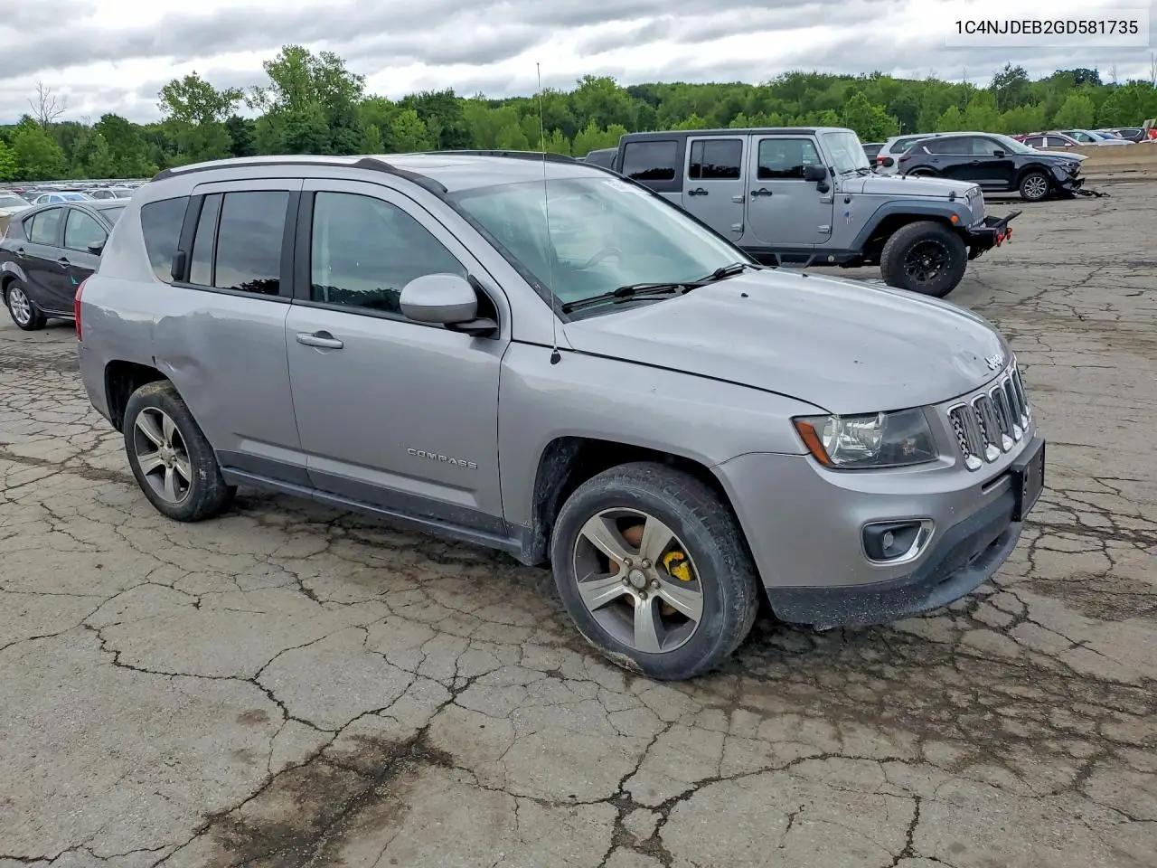 2016 Jeep Compass Latitude VIN: 1C4NJDEB2GD581735 Lot: 58447656
