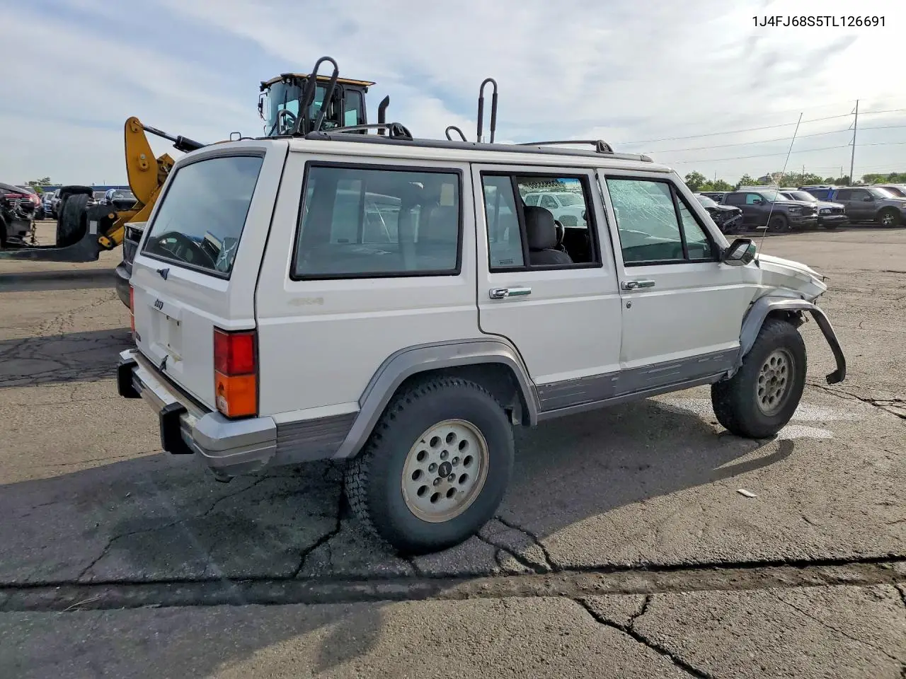 II (XJ)
