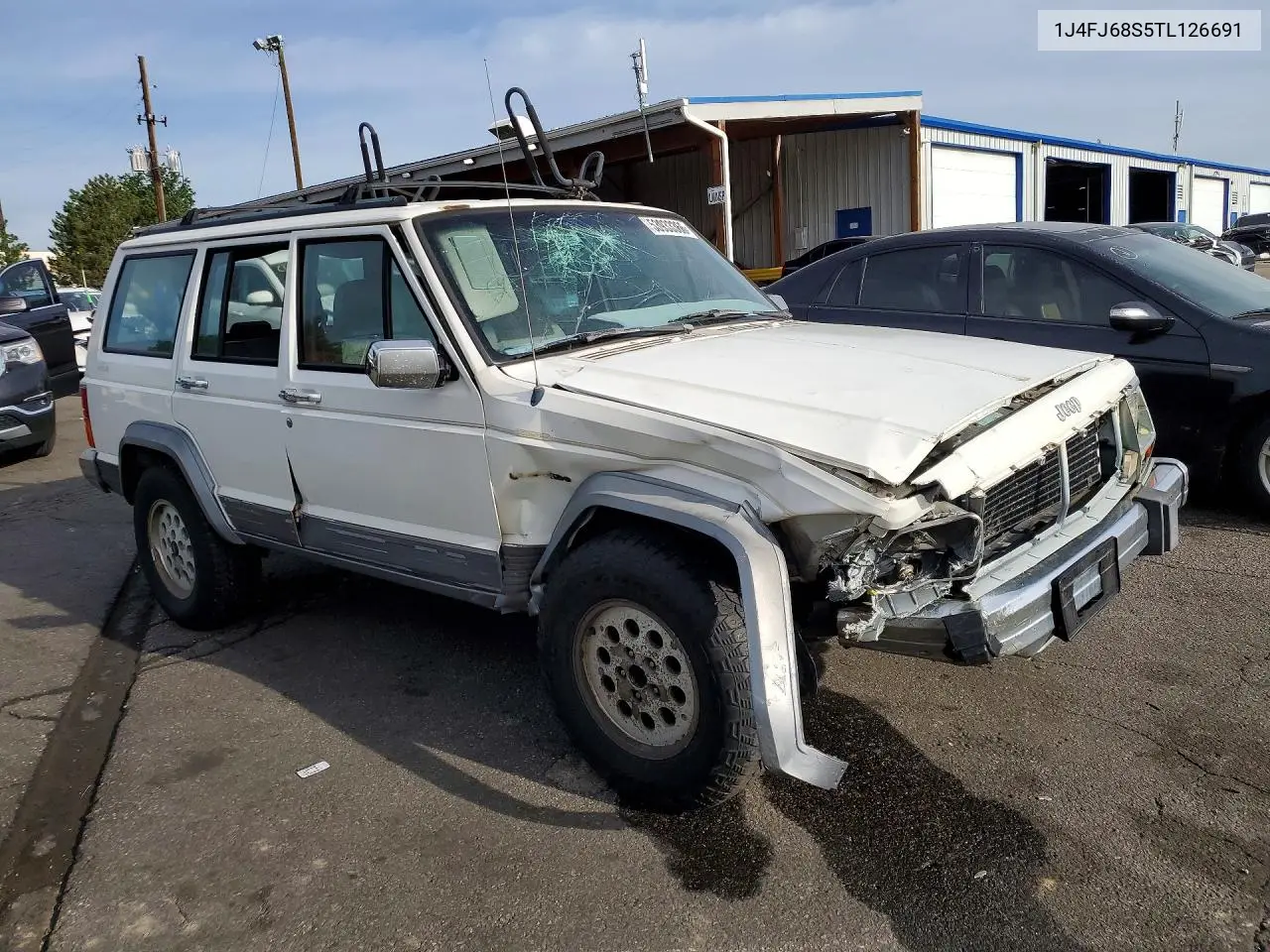 II (XJ)