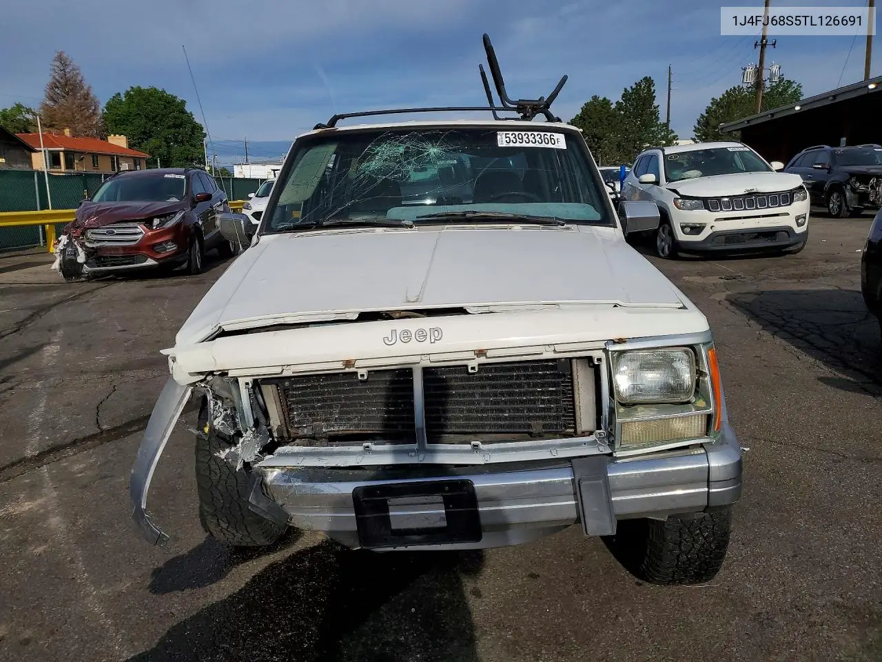 II (XJ)