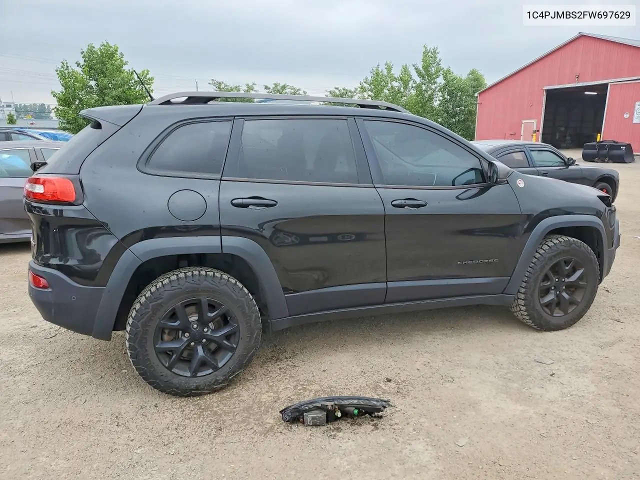 2015 Jeep Cherokee Trailhawk VIN: 1C4PJMBS2FW697629 Lot: 61130046