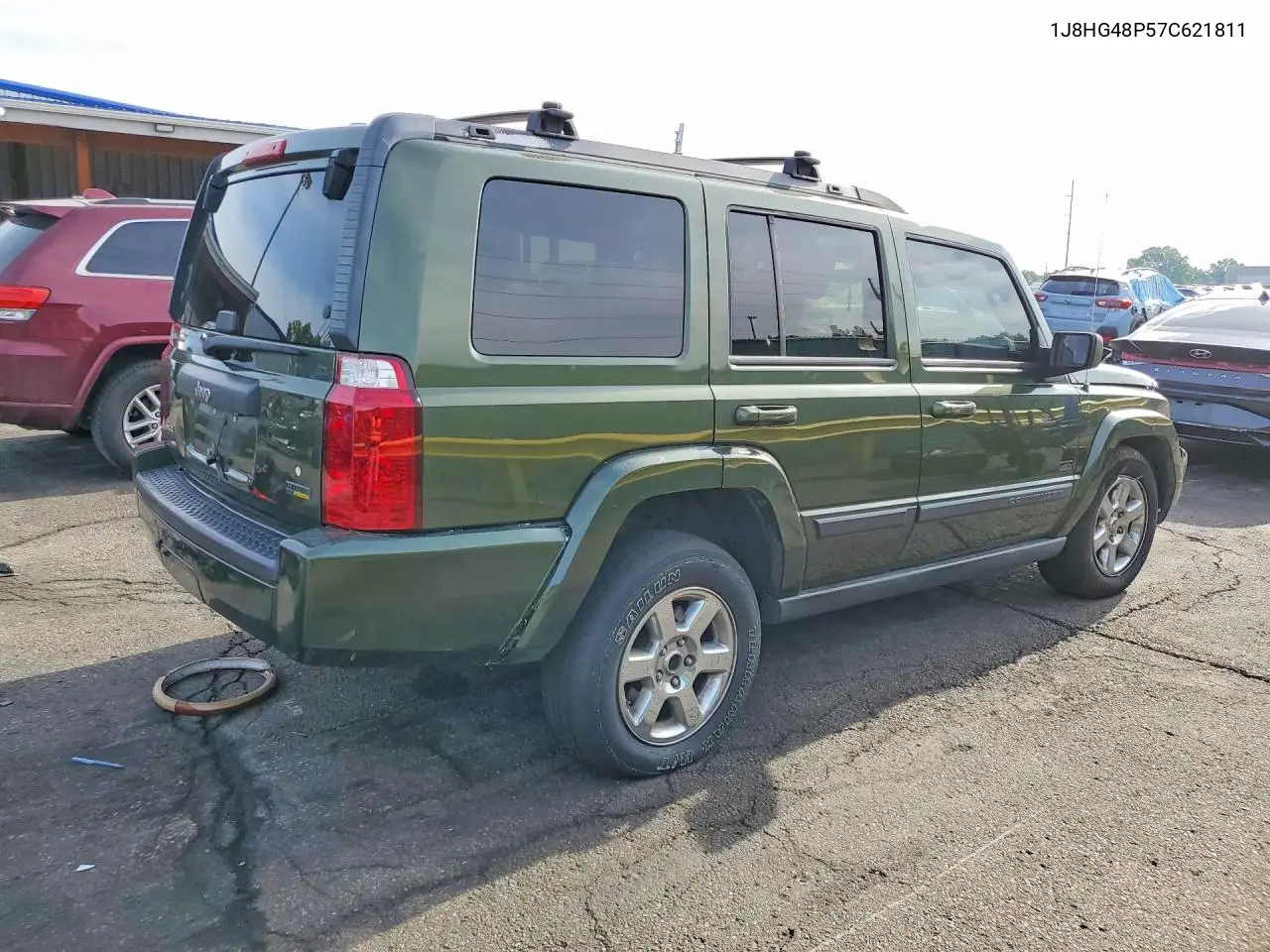2007 Jeep Commander VIN: 1J8HG48P57C621811 Lot: 55597586