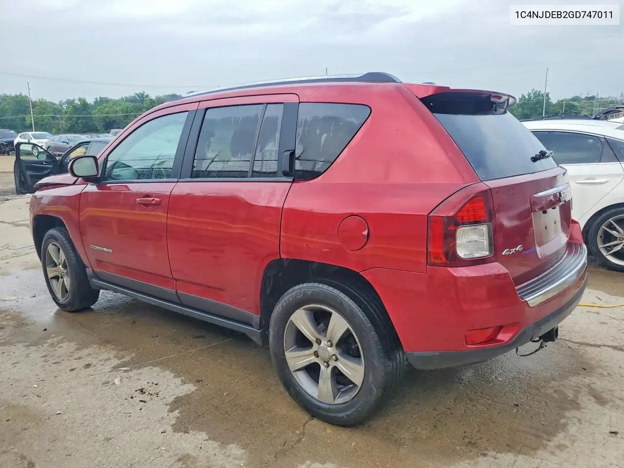 2016 Jeep Compass Latitude VIN: 1C4NJDEB2GD747011 Lot: 61693616