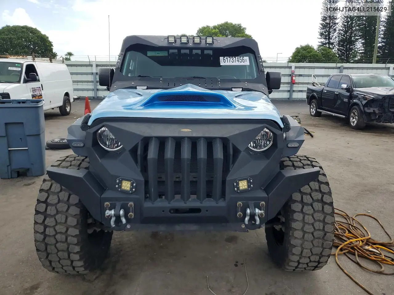 2020 Jeep Gladiator Sport VIN: 1C6HJTAG4LL215629 Lot: 61737456
