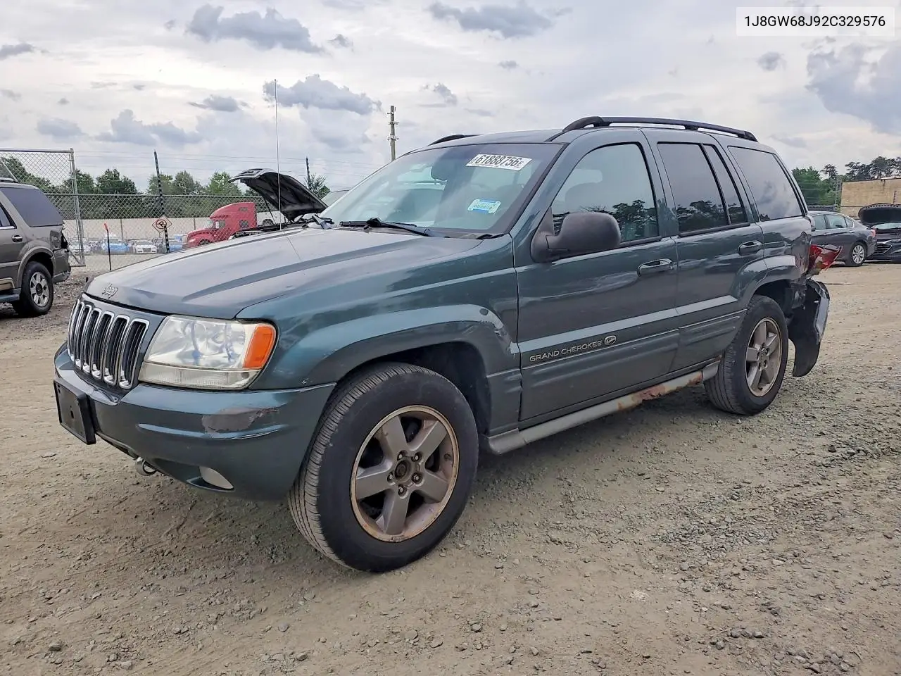 2002 Jeep Grand Cherokee Overland VIN: 1J8GW68J92C329576 Lot: 61888756