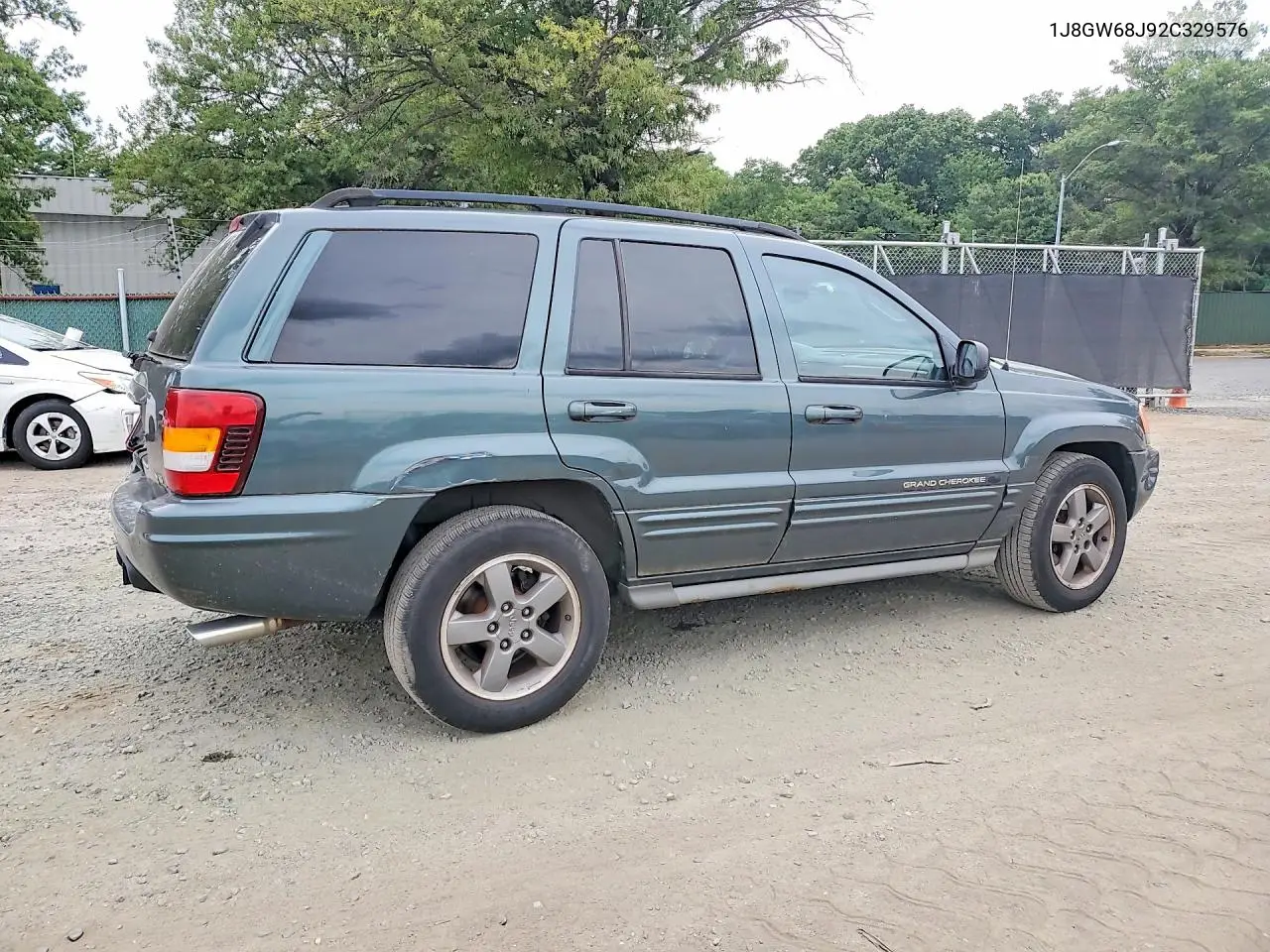2002 Jeep Grand Cherokee Overland VIN: 1J8GW68J92C329576 Lot: 61888756