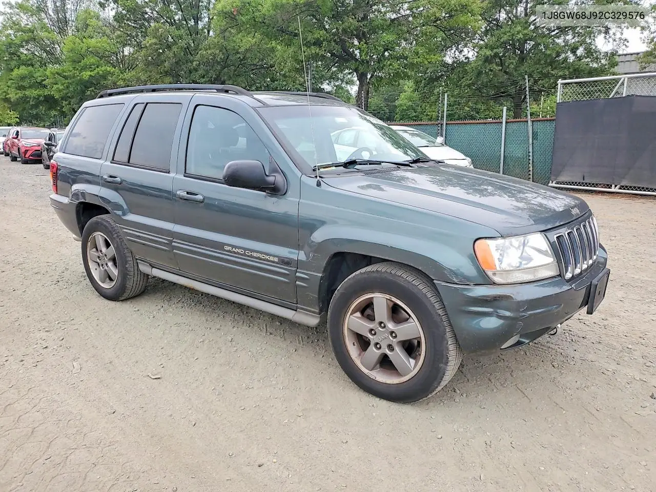 2002 Jeep Grand Cherokee Overland VIN: 1J8GW68J92C329576 Lot: 61888756
