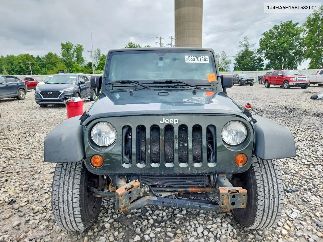 2011 Jeep Wrangler Unlimited Rubicon VIN: 1J4HA6H15BL583001 Lot: 58570746