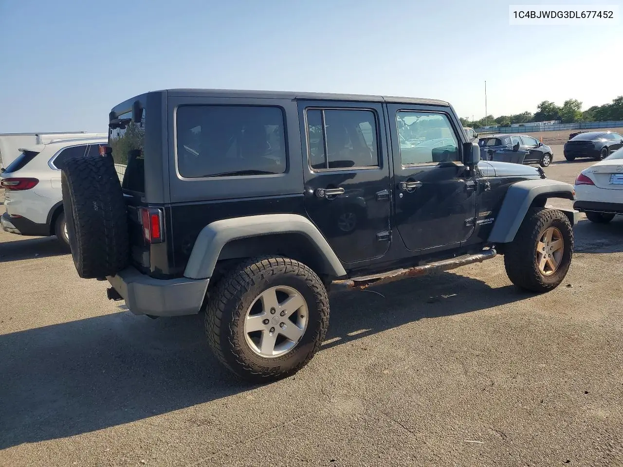 2013 Jeep Wrangler Unlimited Sport VIN: 1C4BJWDG3DL677452 Lot: 60927266