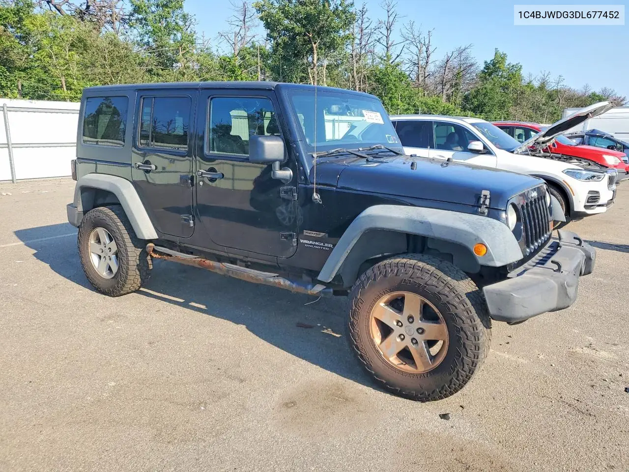 2013 Jeep Wrangler Unlimited Sport VIN: 1C4BJWDG3DL677452 Lot: 60927266