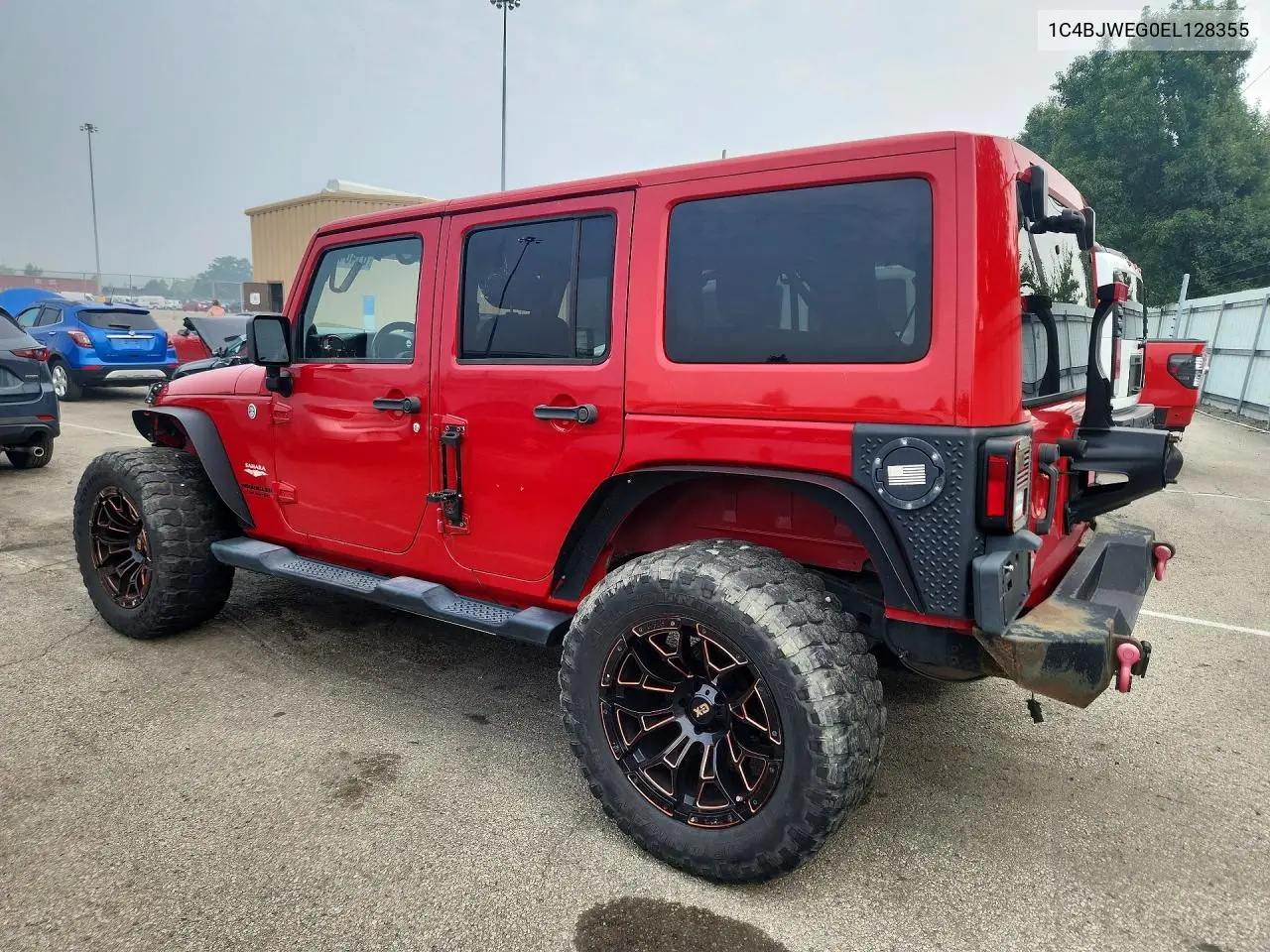 2014 Jeep Wrangler Unlimited Sahara VIN: 1C4BJWEG0EL128355 Lot: 61464656