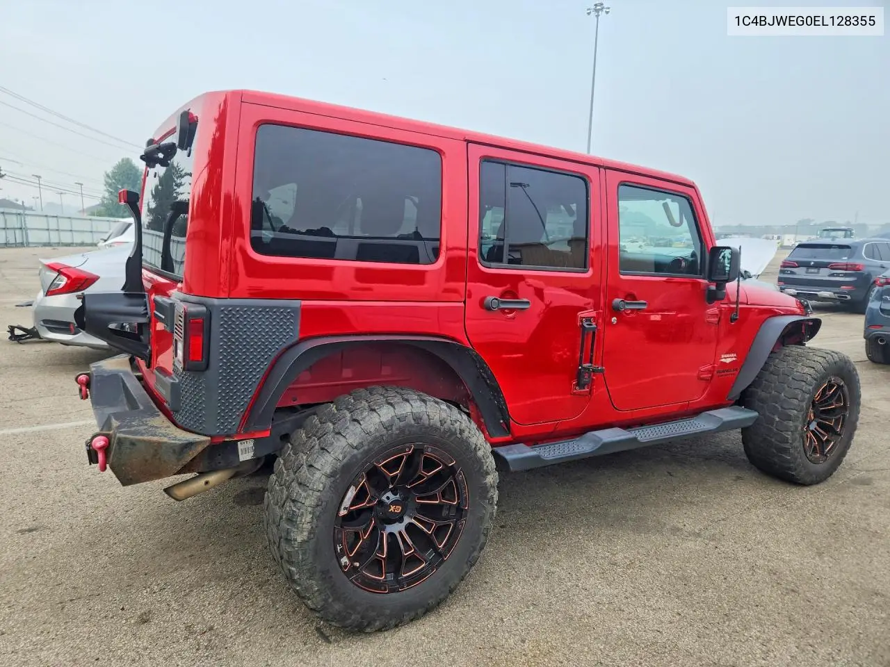 2014 Jeep Wrangler Unlimited Sahara VIN: 1C4BJWEG0EL128355 Lot: 61464656