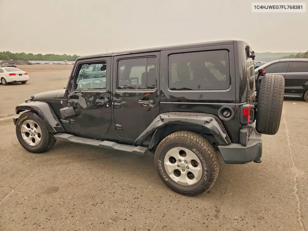 2015 Jeep Wrangler Unlimited Sahara VIN: 1C4HJWEG7FL768381 Lot: 61143416