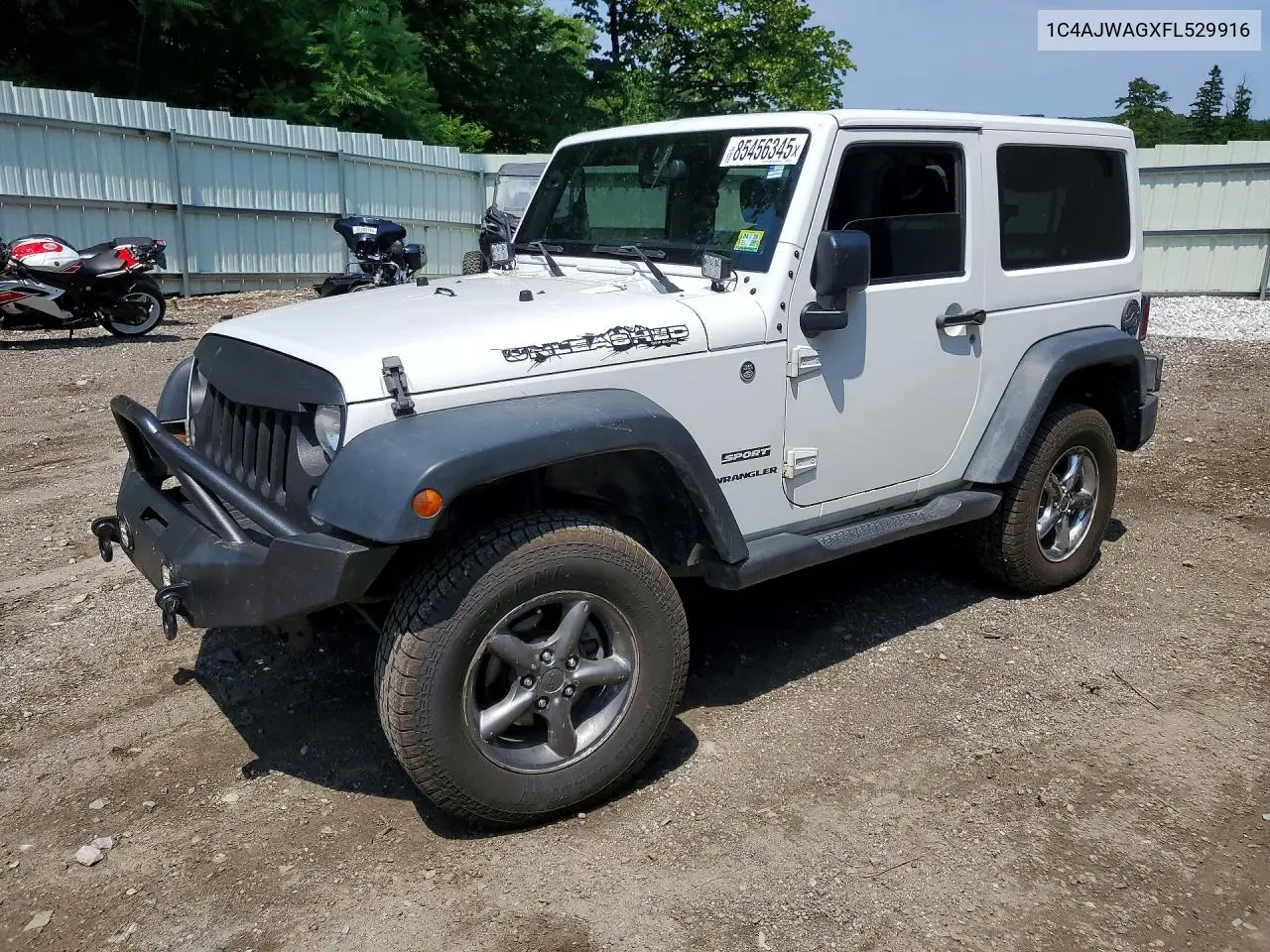 2015 Jeep Wrangler Sport VIN: 1C4AJWAGXFL529916 Lot: 85456345