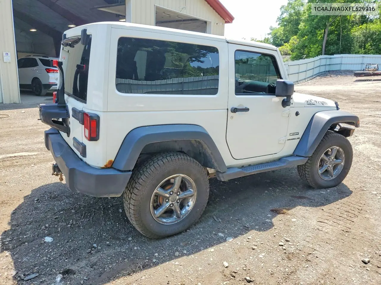 2015 Jeep Wrangler Sport VIN: 1C4AJWAGXFL529916 Lot: 85456345