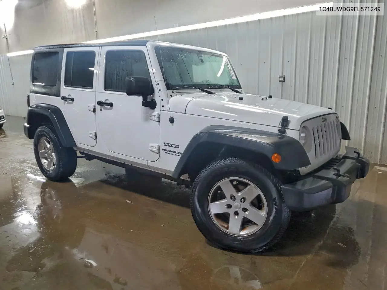 1C4BJWDG9FL571249 2015 Jeep Wrangler Unlimited Sport