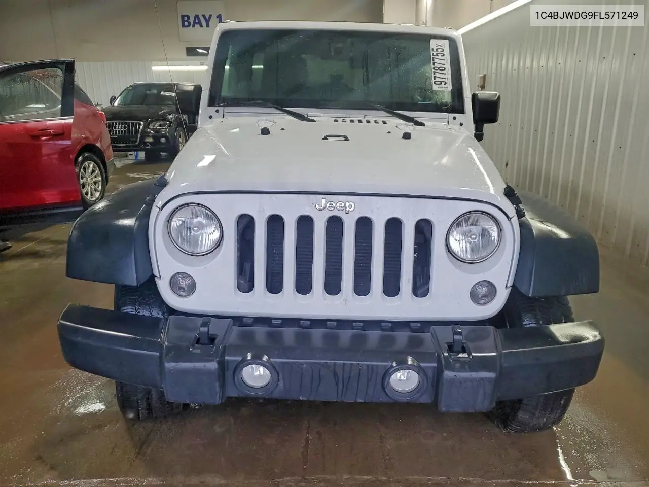 1C4BJWDG9FL571249 2015 Jeep Wrangler Unlimited Sport