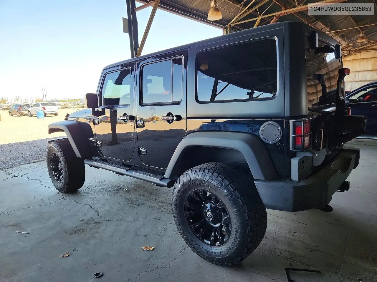2016 Jeep Wrangler Unlimited Sport VIN: 1C4HJWDG5GL235853 Lot: 60885446