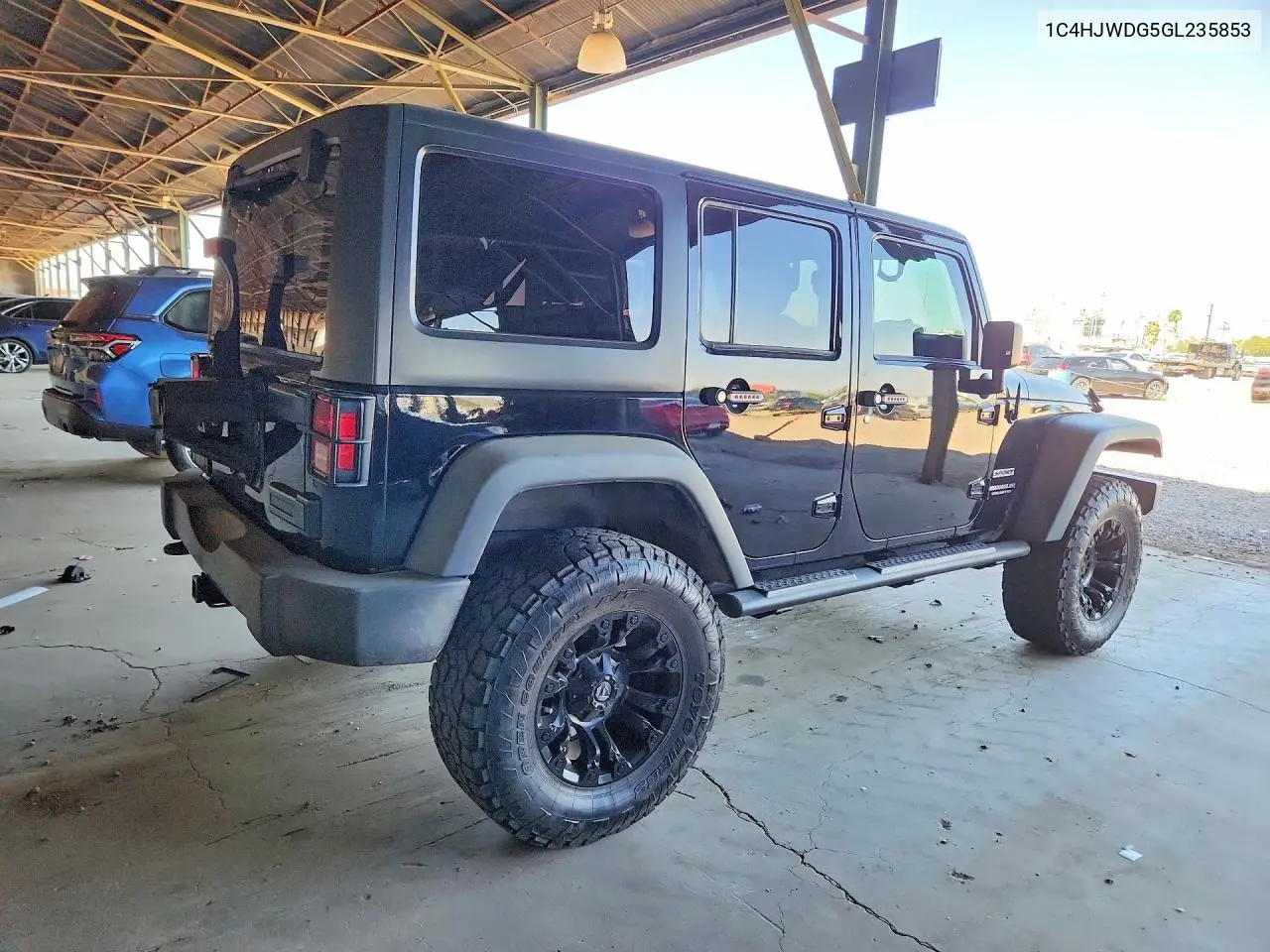 2016 Jeep Wrangler Unlimited Sport VIN: 1C4HJWDG5GL235853 Lot: 60885446