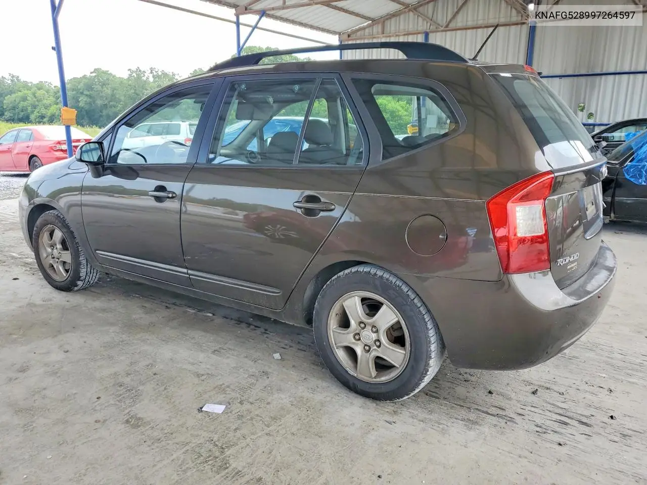 2009 Kia Rondo Base VIN: KNAFG528997264597 Lot: 58685176