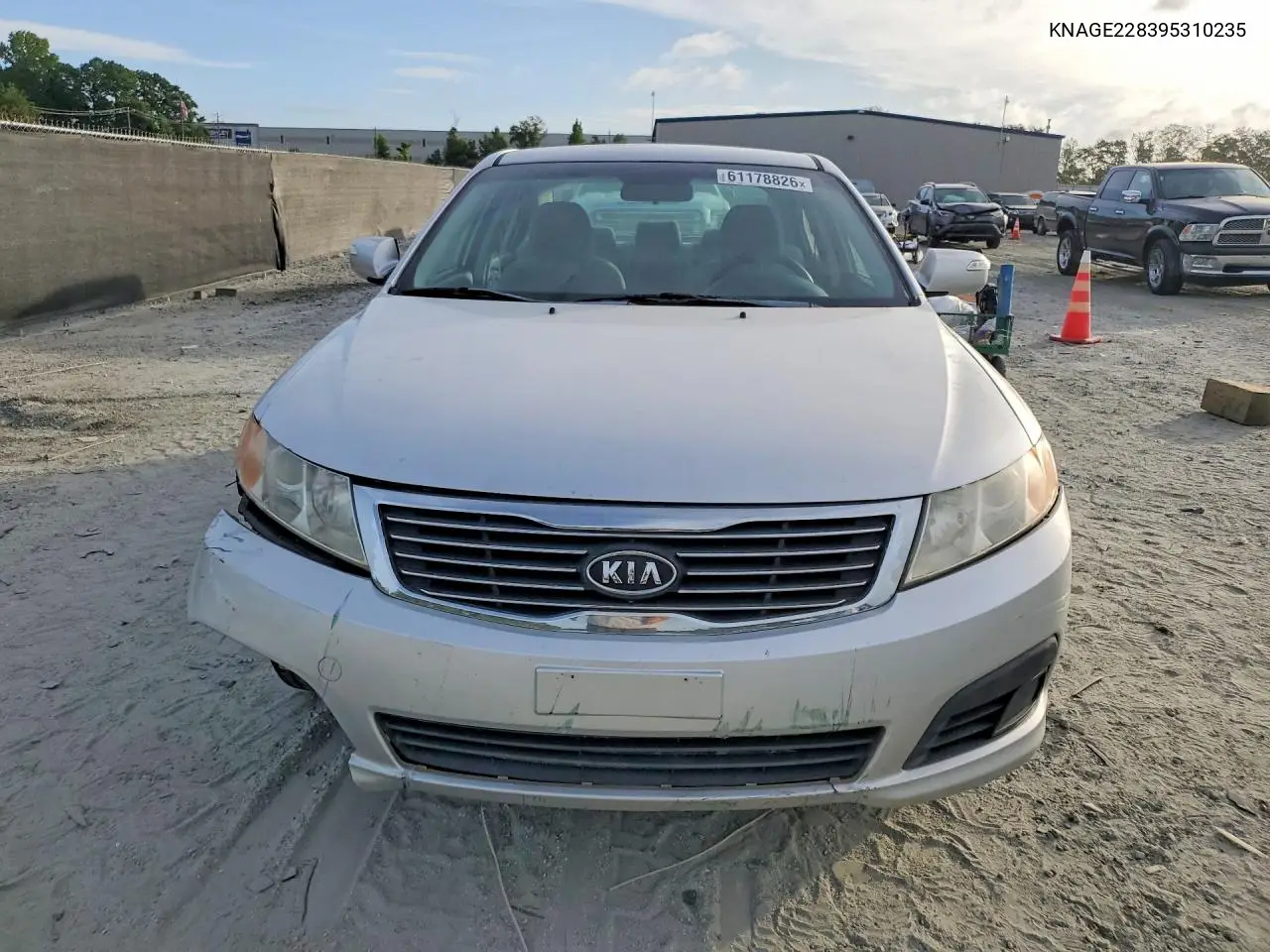 2009 Kia Optima Lx/Ex VIN: KNAGE228395310235 Lot: 61178826