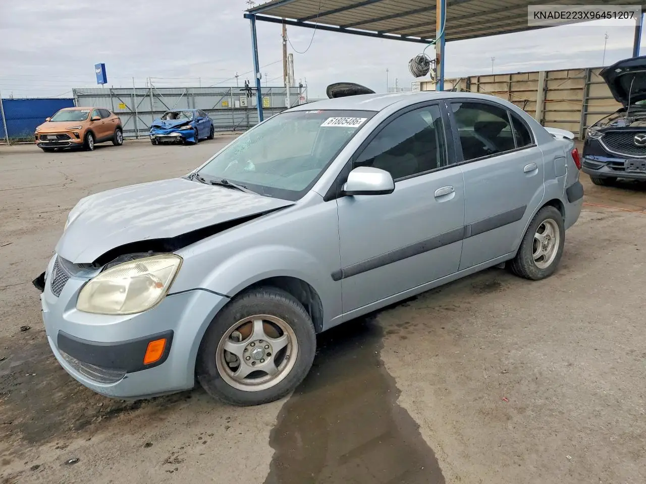 2009 Kia Rio Base VIN: KNADE223X96451207 Lot: 61805486