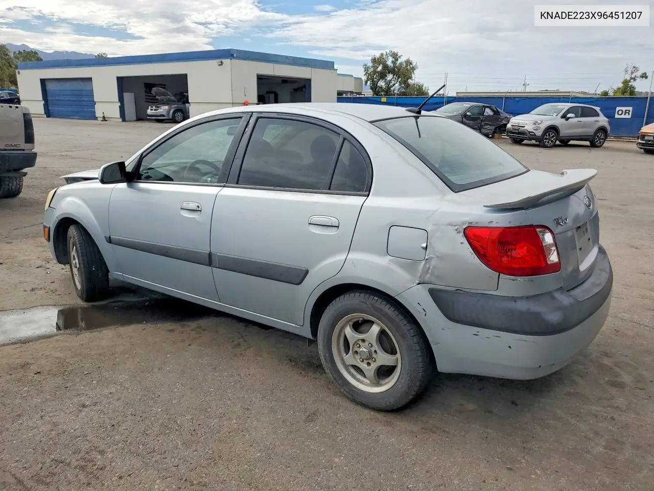 2009 Kia Rio Base VIN: KNADE223X96451207 Lot: 61805486