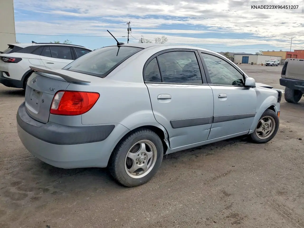 2009 Kia Rio Base VIN: KNADE223X96451207 Lot: 61805486