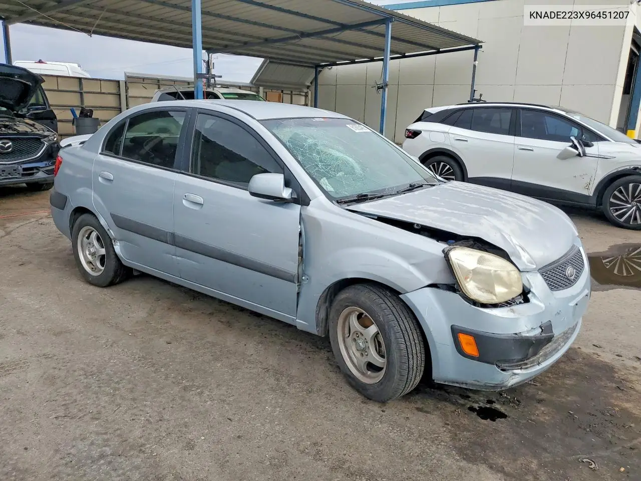 2009 Kia Rio Base VIN: KNADE223X96451207 Lot: 61805486