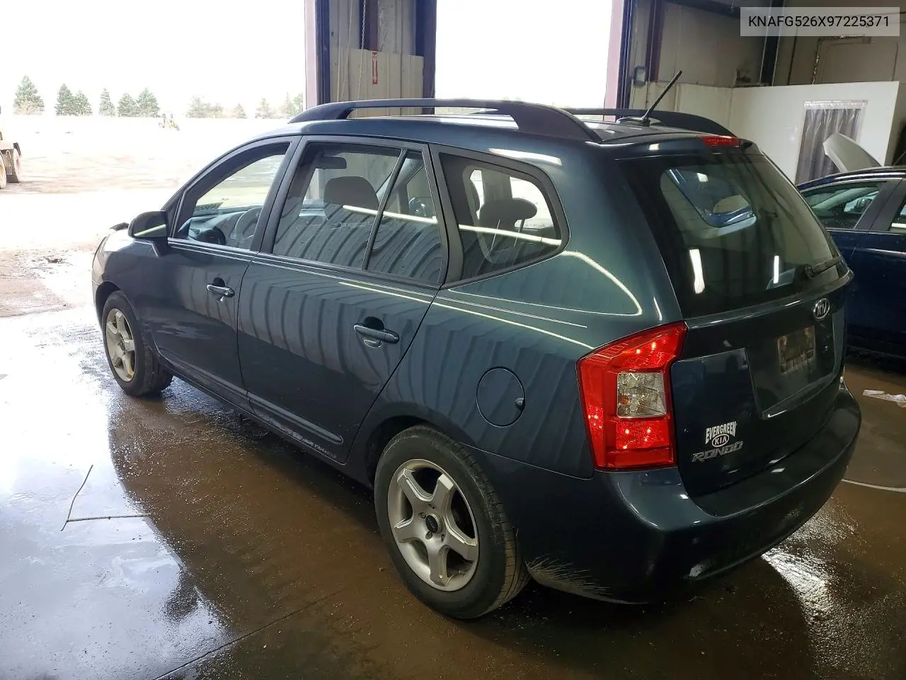 2009 Kia Rondo Lx VIN: KNAFG526X97225371 Lot: 49860056