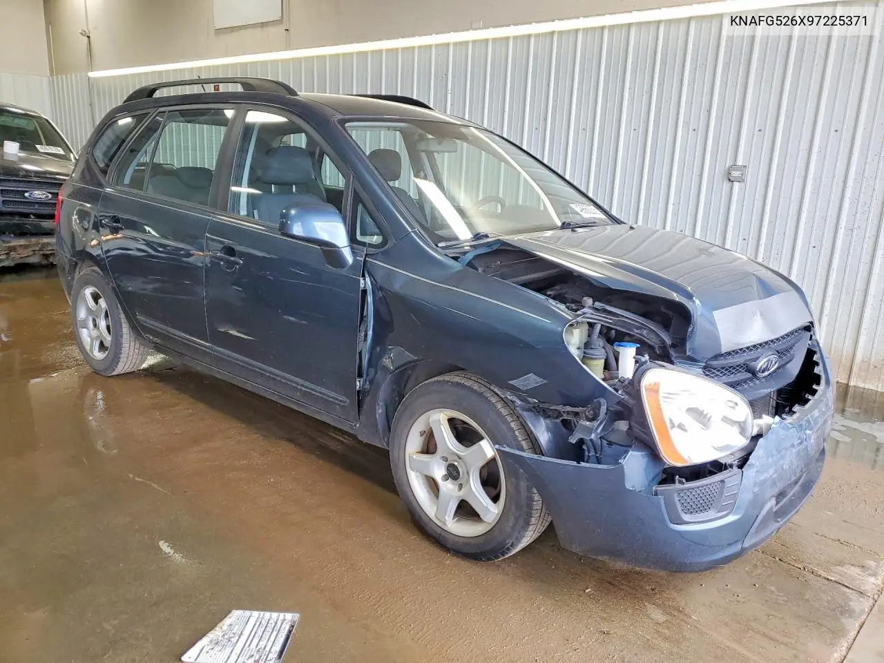 2009 Kia Rondo Lx VIN: KNAFG526X97225371 Lot: 49860056