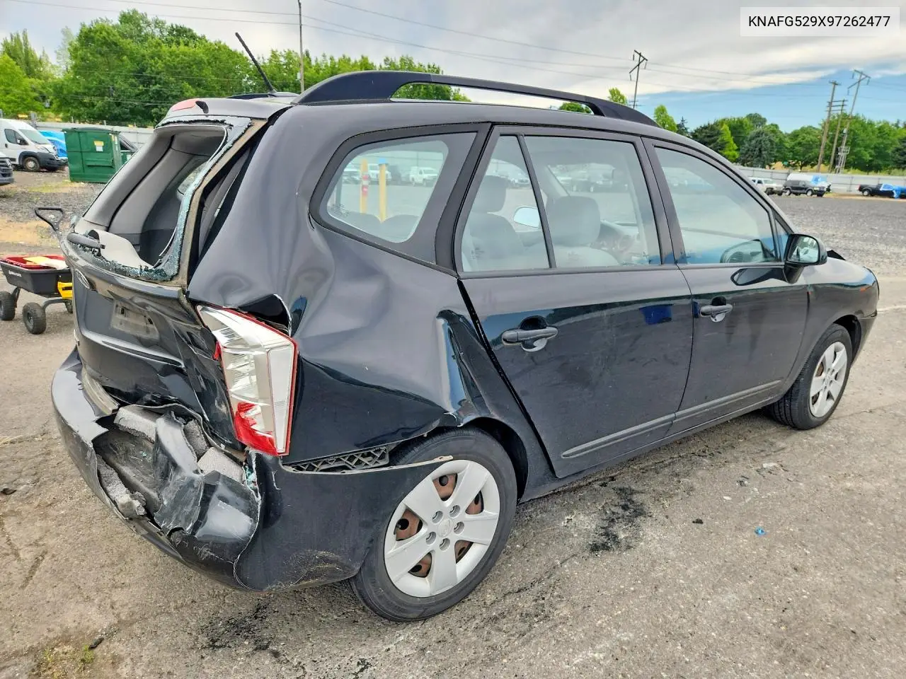 2009 Kia Rondo Base VIN: KNAFG529X97262477 Lot: 58422666