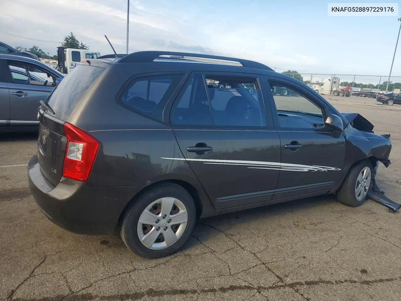 2009 Kia Rondo Base VIN: KNAFG528897229176 Lot: 60256576