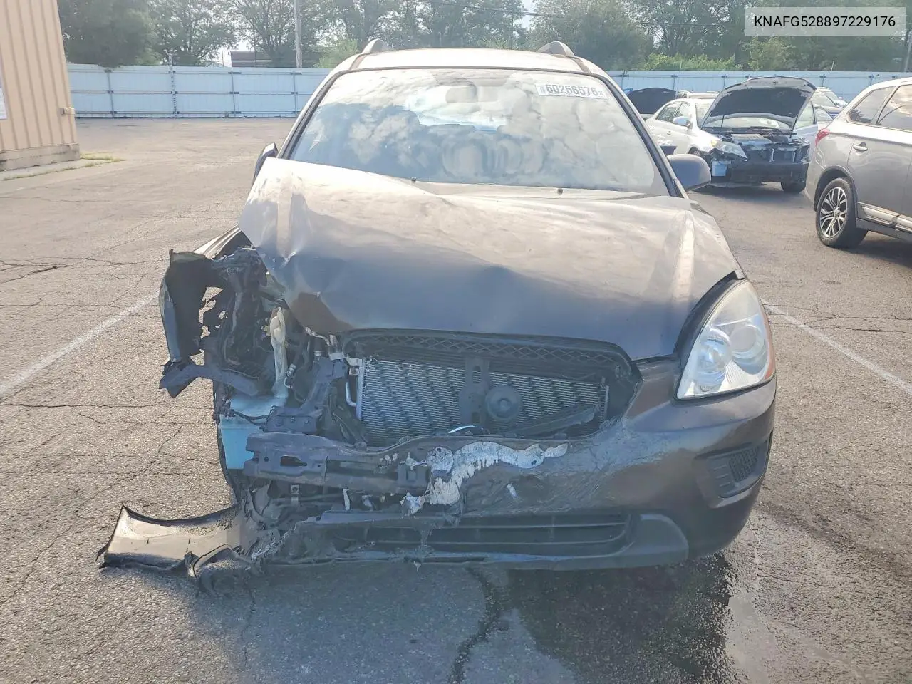 2009 Kia Rondo Base VIN: KNAFG528897229176 Lot: 60256576