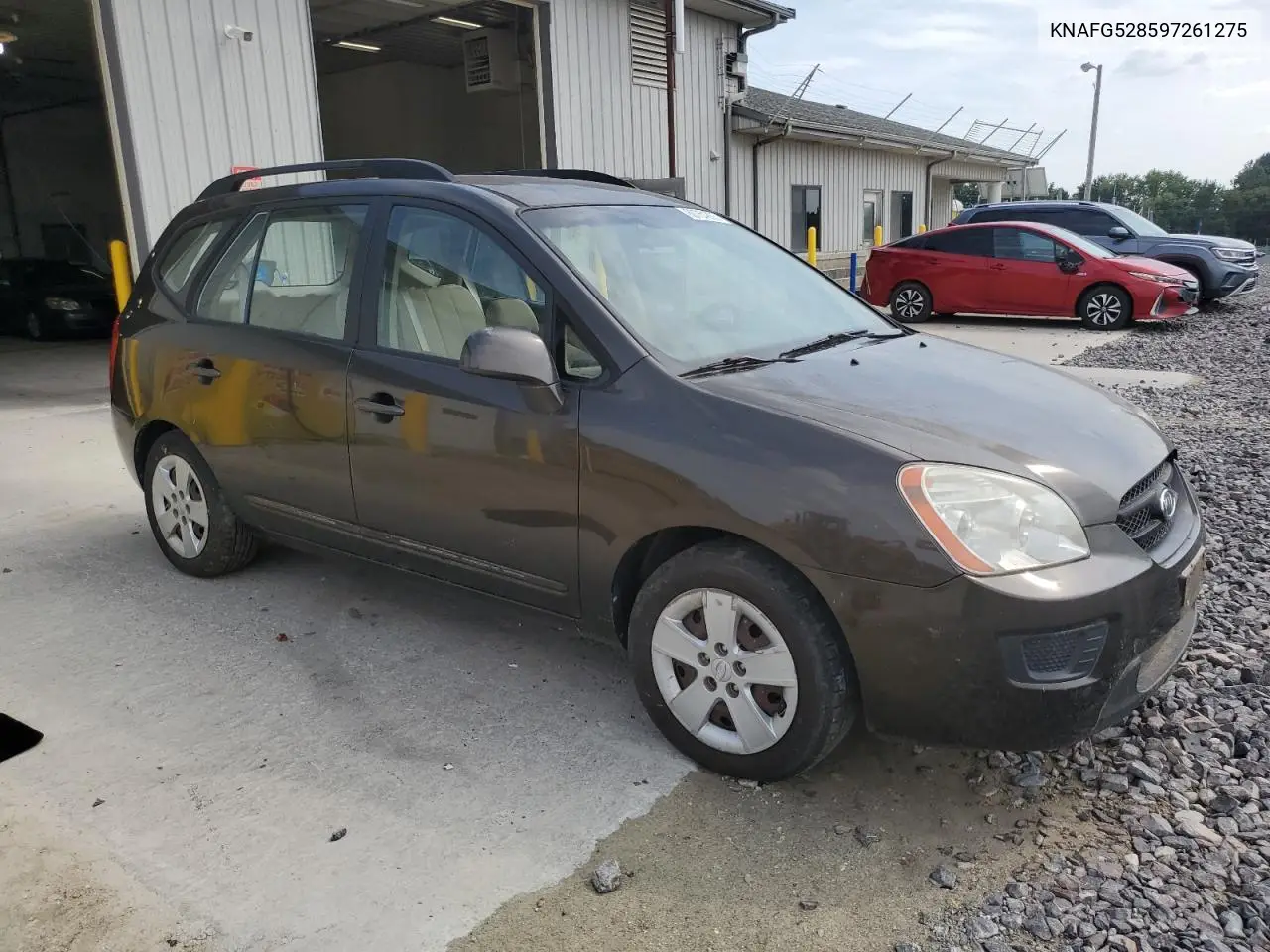 2009 Kia Rondo VIN: KNAFG528597261275 Lot: 61197616