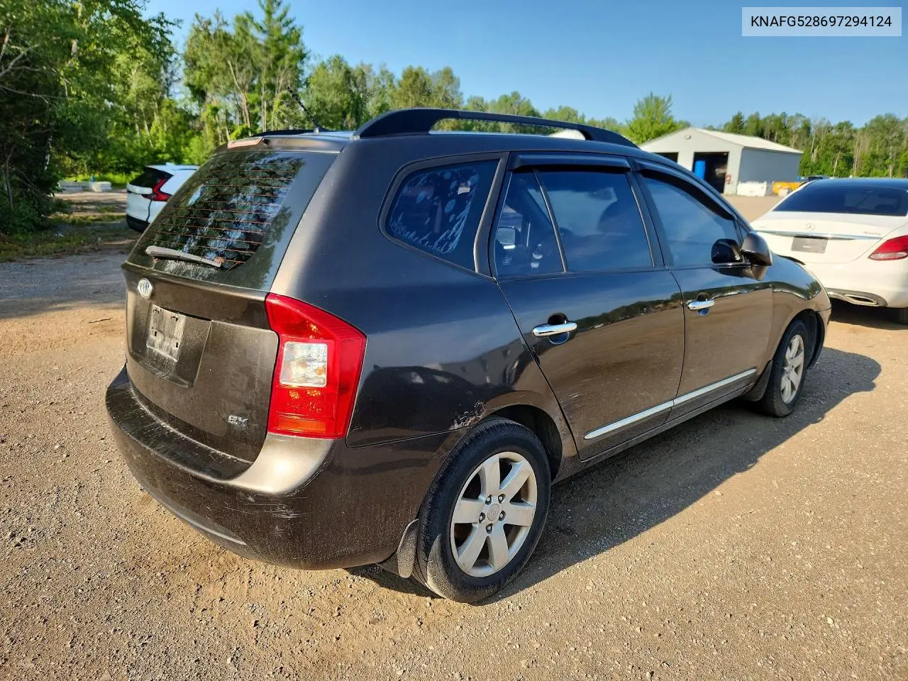 2009 Kia Rondo Base VIN: KNAFG528697294124 Lot: 61445296