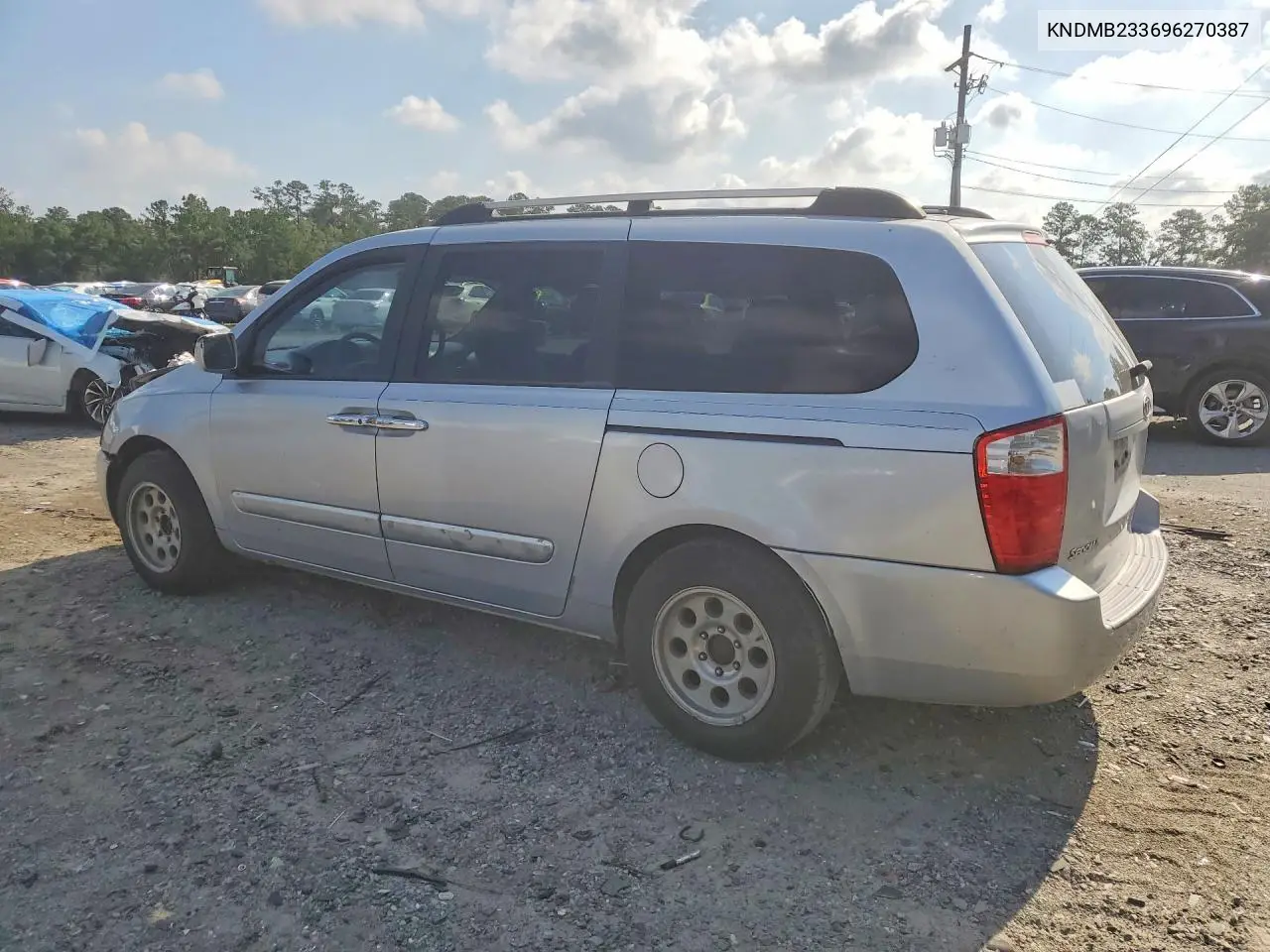 2009 Kia Sedona Lx VIN: KNDMB233696270387 Lot: 58003986