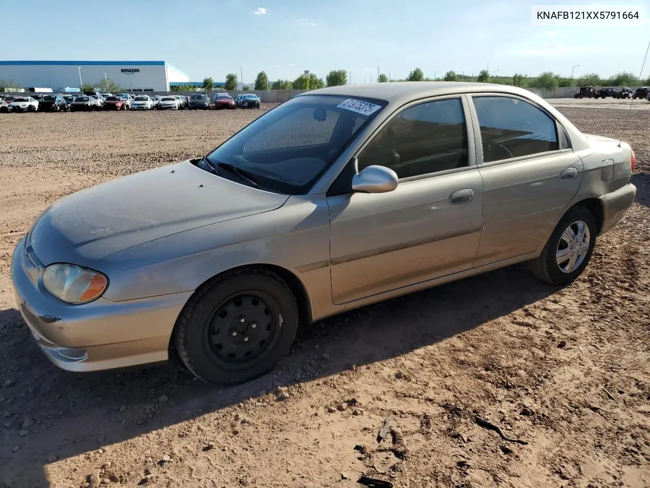 1999 Kia Sephia Base VIN: KNAFB121XX5791664 Lot: 81975375