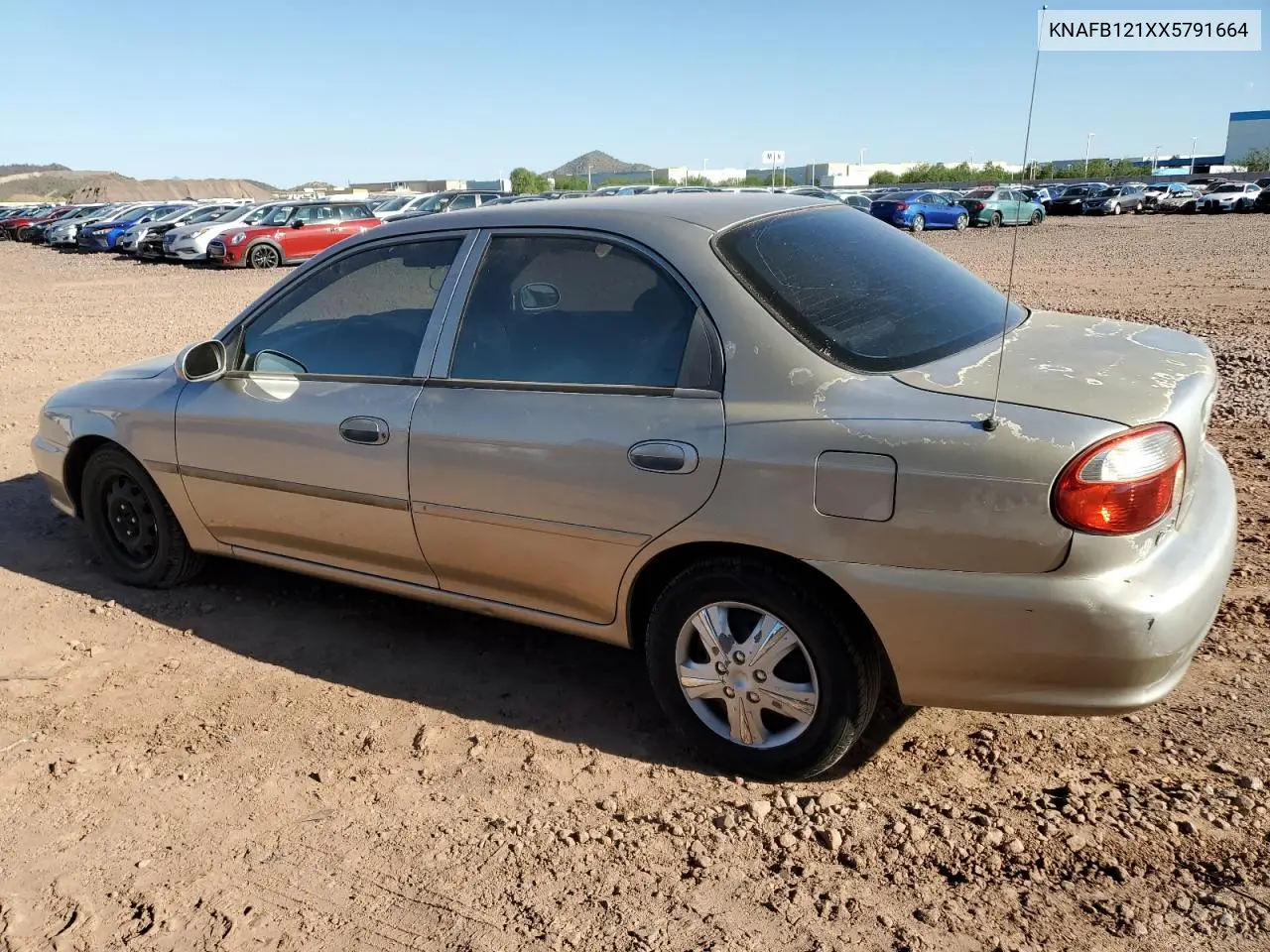 1999 Kia Sephia Base VIN: KNAFB121XX5791664 Lot: 81975375
